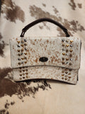 Cowhide + Tack Flip Purse