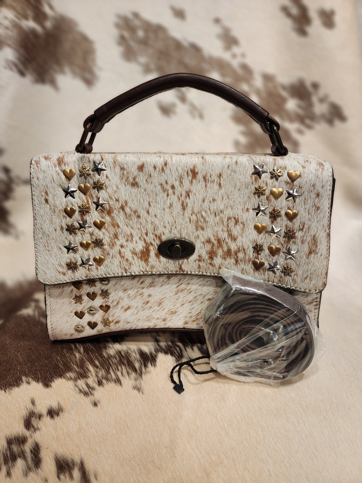 Cowhide + Tack Flip Purse